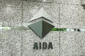AIDA ENGINEERING signage and logo